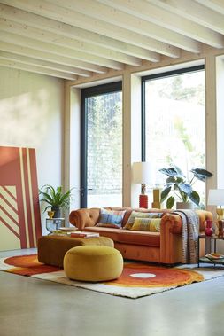 DFS Belair three-seater sofa bed in orange sensual velvet