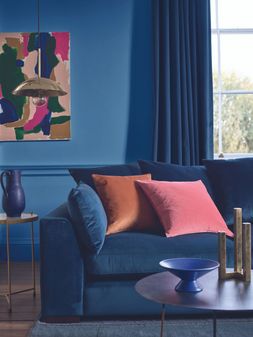 DFS Plush large chaise sofa in dark blue velvet