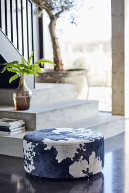 DFS Vegan Freedom footstool in black cow Vegan Accent fabric