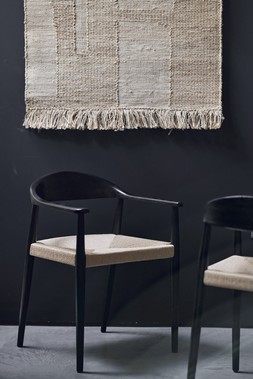 Dwell Cosma dining chair in Black Oak and Rattan, available at DFS