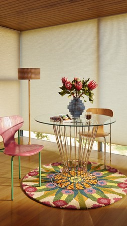 Yinka Round Metal Glass Dining Table £349 & Yinka Plywood Dining Chair Two Tone Pink Seat Green Legs £79 & Yinka Ilori Kaleidoscope Floral Round Rug 133x133cm £135