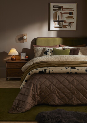 Cosy Home Winter Chocolate -- Tufted abstract framed canvas £60 | Darla bed £399 | Timeless fur double duvet cover set £33 from Dunelm