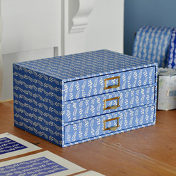 A Flight of Enid Marx’s Necktie-Covered Collector’s Drawers