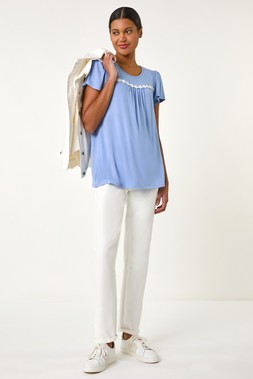 Roman Light Blue Daisy Trim Stretch Top