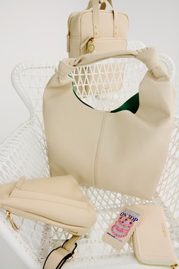 Oliver Bonas Mami Cream Backpack £62 - Brooke Cream Belt Bag £42 - Cherry On Top Card Holder £16 - Maddie Ecru Purse £30 - Ella Knot Slouch Cream Tote £65