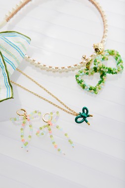 Oliver Bonas Rylie Beaded Bow Drop Huggies £18 -Heath Green & Blue Stripe Bow Scrunchie £12.50 -Kiela Green Beaded Heart Drop Earrings £22 -Kylie Green Enamel Bow Pen
