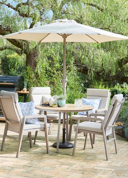 Sorrento 4 Seat Dining Set, £1399; Garden Life Floral Motif 45x45 cushion, £19.99; Garden Life Blue Monstera 45x45 cushion, £19.99