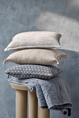 The Very Collection Cushions from €21, Quilted Bedspread €65, Side Table €179 at Very.ie