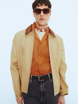 M&S Jacket £65, M&S Shirt £35, M&S T-Shirt £18, M&S Jeans £35, Sunglasses £35, Neckerchief £16, Belt £22, Bracelet £20